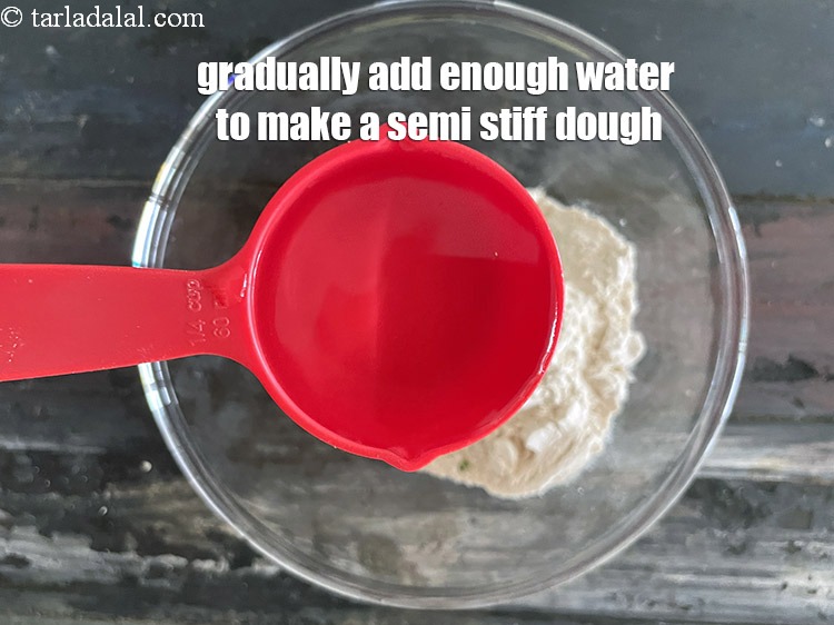 Step 11 – Gradually add enough water to make a&nbsp;semi-stiff dough. We added 1/4&nbsp;cup water and then added …