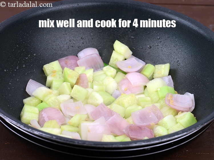 Step 10 – Mix well and cook on a medium flame for 4 minutes, while stirring occasionally.