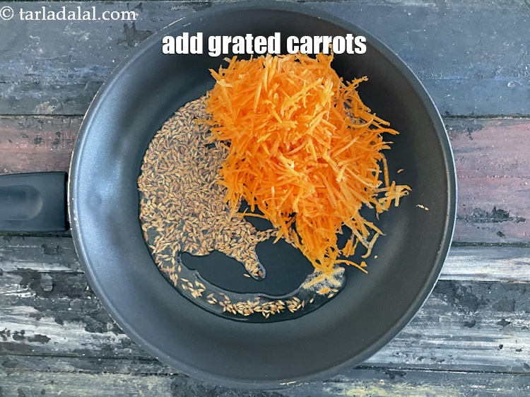 Step 12 – Add&nbsp;<meta charset="UTF-8" />1 cup&nbsp;<a href="glossary-grated-carrot-816i">grated carrot</a>.