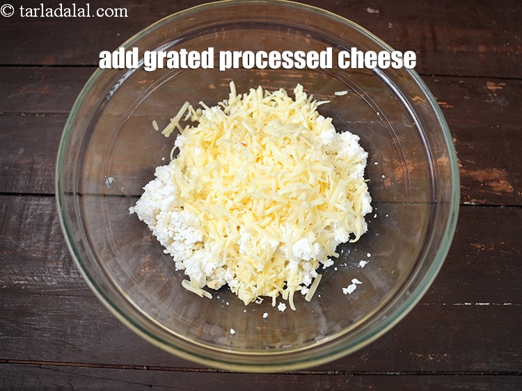 Step 10 – Add 1/2 cup <a href="https://www.tarladalal.com/glossary-grated-processed-cheese-868i">grated processed cheese</a>.