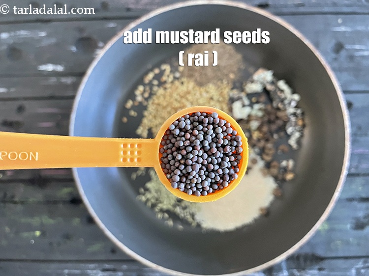 Step 10 – Add&nbsp;<meta charset="UTF-8" />1 tsp&nbsp;<a href="glossary-mustard-seeds-sarson-rai-sarson-ke-beej-525i">mustard seeds ( rai / sarson)</a>.