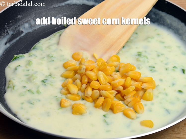Step 10 – Add 1/4 cup&nbsp;<a href="https://www.tarladalal.com/glossary-boiled-sweet-corn-kernels-153i">boiled sweet corn kernels (makai ke dane)</a>.&nbsp;