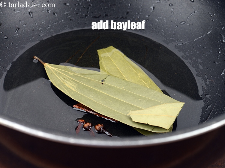 स्टेप 10 – २&nbsp;<a href=""https://www.tarladalal.com/glossary-bay-leaf-tejpatta-bay-leaves-hindi-189i"">तेजपत्ता</a>&nbsp;डालें।&nbsp;&nbsp;