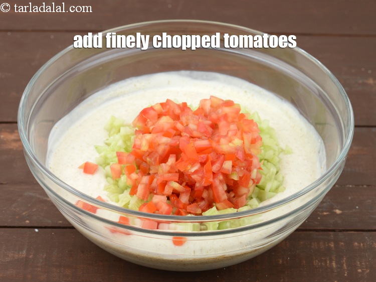 Step 15 – Add &frac12; cup finely <a href="https://www.tarladalal.com/glossary-chopped-tomatoes-779i">chopped tomatoes</a>.