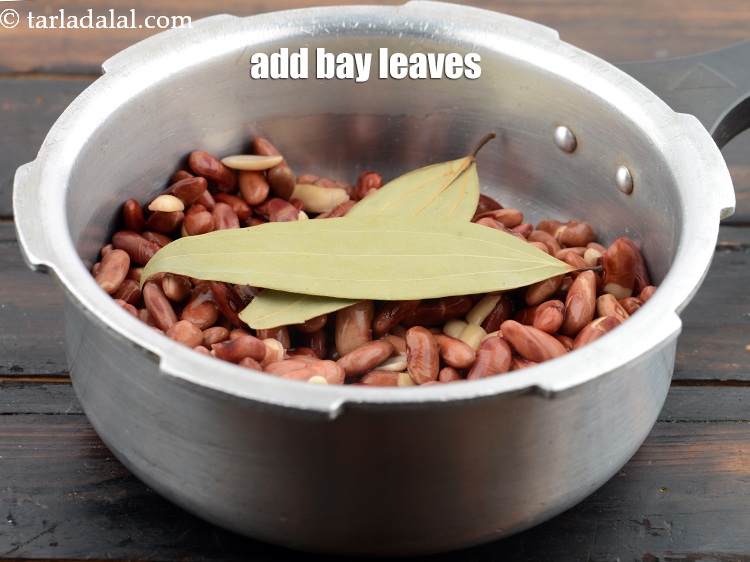 Step 11 – Add 2 to 3&nbsp;<a href="https://www.tarladalal.com/glossary-bay-leaf-tejpatta-bay-leaves-189i">bay leaves (tejpatta)</a>.