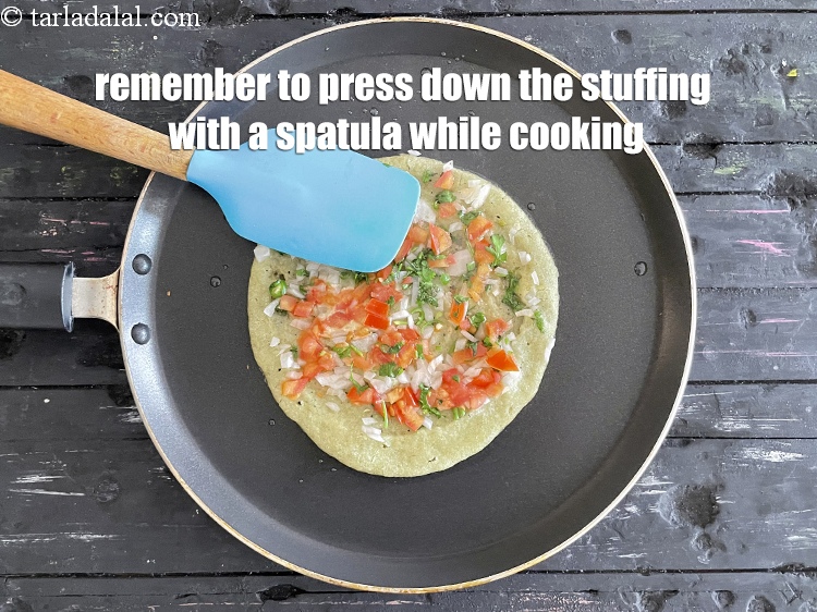 Step 42 – Rememer to press the stuffing down with a spatula while cooking.