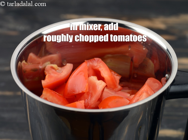 Step 11 – In a mixer, add 2 cups roughly <a href="https://tarladalal.com/glossary-chopped-tomatoes-779i">chopped tomatoes</a>.