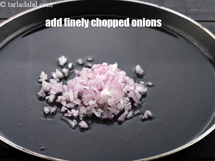 Step 10 – Add the 1/4 cup finely&nbsp;<a href="https://www.tarladalal.com/glossary-chopped-onions-722i">chopped onions</a>.