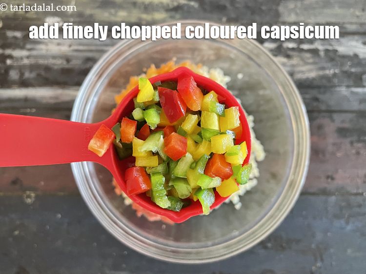 Step 18 – Add&nbsp;<meta charset="UTF-8" />1/4 cup&nbsp;finely&nbsp;<a href="glossary-chopped-capsicum-164i">chopped capsicum</a>.