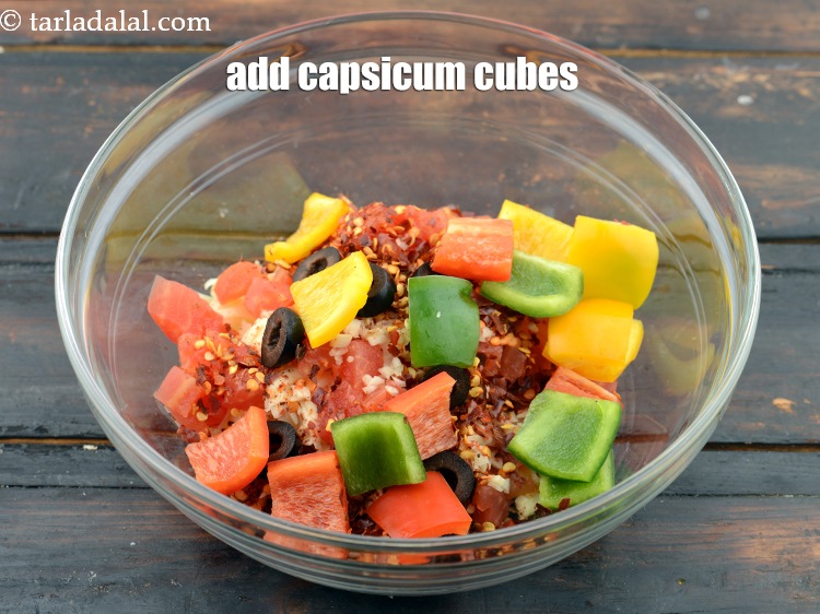 Step 10 – Add 1/2 cup&nbsp;<a href="https://www.tarladalal.com/glossary-capsicum-cubes-170i">capsicum cubes</a>&nbsp;(red , yellow and green). You can also chop&nbsp;the capsicum instead …