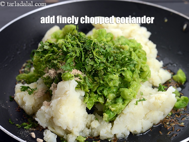 Step 11 – Add 1 tbsp finely <a href="https://www.tarladalal.com/glossary-chopped-coriander-783i">chopped coriander (dhania)</a>.