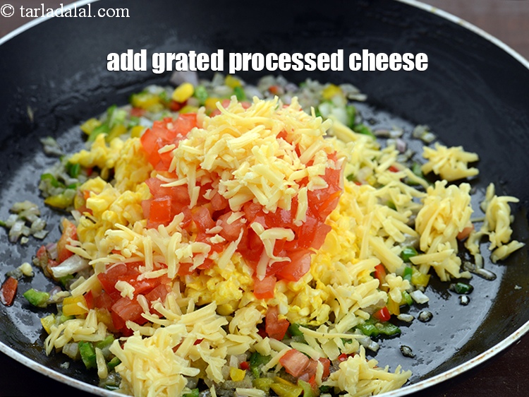Step 10 – Add 1/4 cup <a href="https://www.tarladalal.com/glossary-grated-processed-cheese-868i">grated processed cheese</a>.