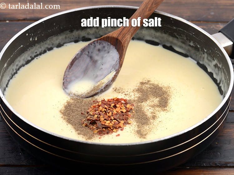 Step 10 – Add&nbsp;<a href="https://www.tarladalal.com/glossary-salt-namak-table-salt-418i">salt</a>&nbsp;for sprinkling