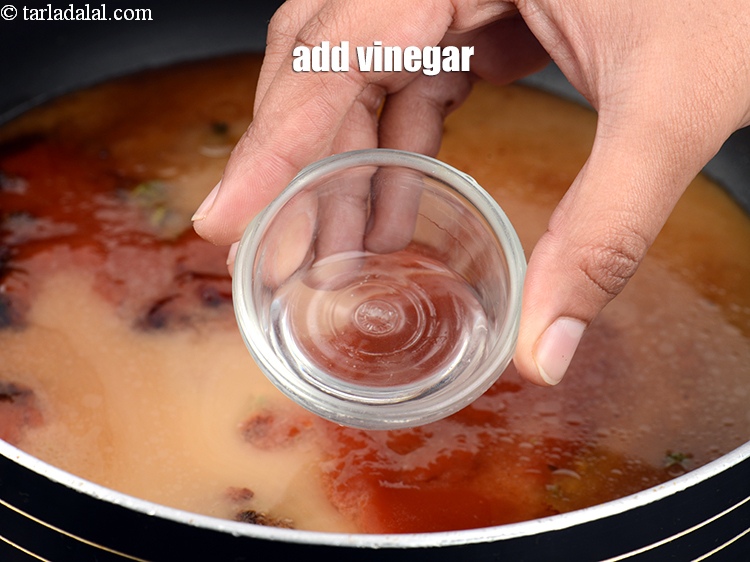 Step 11 – Add 2 tsp <a href="https://www.tarladalal.com/glossary-vinegar-sirka-cooking-vinegar-341i">vinegar</a>.