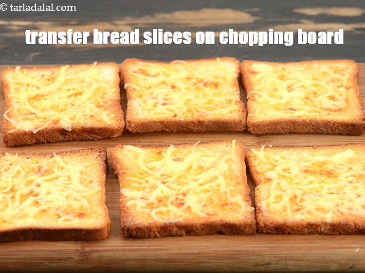 Step 10 – Transfer he bread slices on a chopping board.