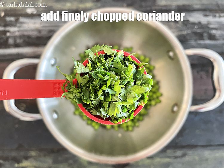Step 12 – Add&nbsp;2 tbsp&nbsp;finely&nbsp;<a href="https://tarladalal.com/glossary-chopped-coriander-783i">chopped coriander (dhania)</a>.