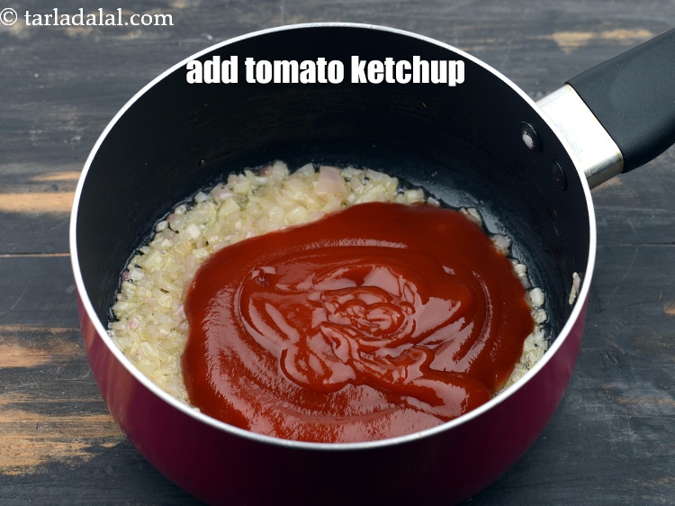 Step 11 – Add 1/2 cup&nbsp;<a href="https://www.tarladalal.com/glossary-tomato-ketchup-tomato-sauce-181i">tomato ketchup</a>.