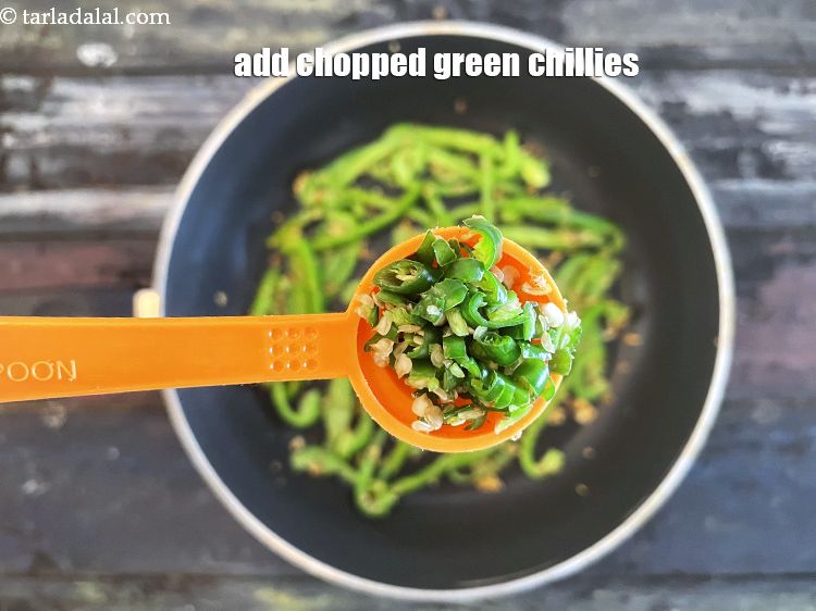 Step 17 – Add&nbsp;<meta charset="UTF-8" />1 tsp&nbsp;finely&nbsp;<a href="glossary-chopped-green-chilli-820i">chopped green chillies</a>.