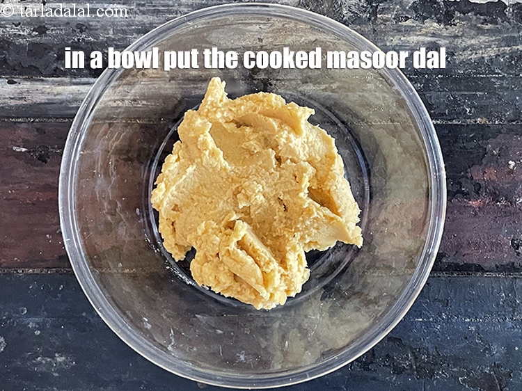 Step 17 – <meta charset="UTF-8" />In a bowl put&nbsp;the cooked masoor.&nbsp;