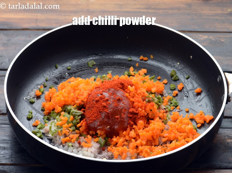 Step 10 – Add 1 tsp&nbsp;<a href="https://www.tarladalal.com/glossary-chilli-powder-red-chilli-powder-339i">chilli powder</a>.&nbsp;