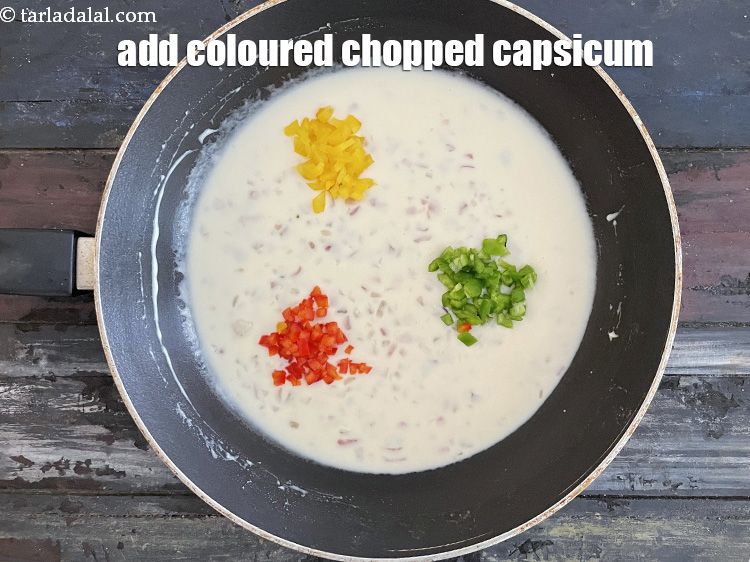 Step 17 – Add 3&nbsp;tbsp&nbsp;finely coloured&nbsp;<a href="glossary-chopped-capsicum-164i">chopped capsicum</a>.
