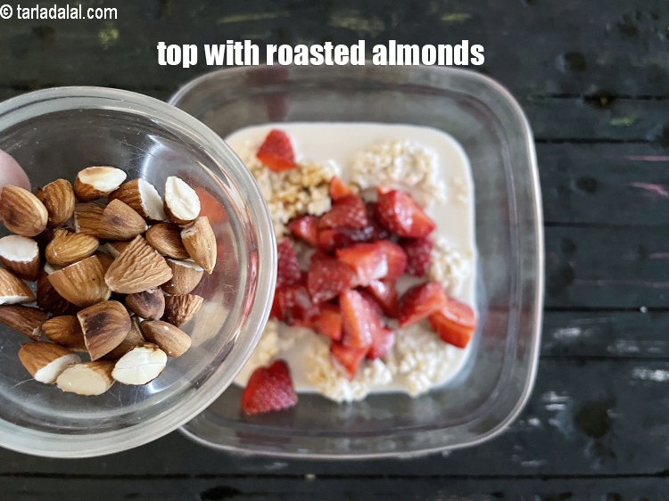 Step 12 – Top with healthy&nbsp;roasted almonds. They give a nice crunch to&nbsp;s<strong>trawberry steel cut oatmeal</strong>.