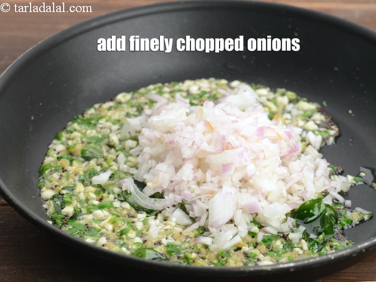 Step 12 – Add &frac14; cup finely <a href="https://www.tarladalal.com/glossary-chopped-onions-722i">chopped onions</a>&nbsp;.
