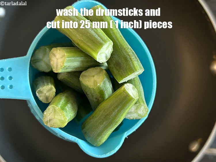 Step 10 – Wash the drumsticks and cut into&nbsp;25 mm. (1") pieces.