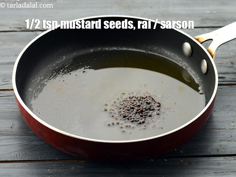 Step 19 – Add the 1/2 tsp&nbsp;<a href="https://www.tarladalal.com/glossary-mustard-seeds-sarson-rai-sarson-ke-beej-525i">mustard seeds ( rai / sarson)</a>.