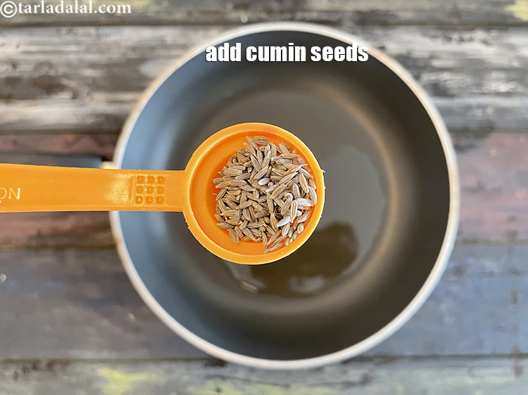 Step 11 – <html><head><meta charset="UTF-8"></head><body><p>Add&nbsp;1/2 tsp&nbsp;<a href="glossary-cumin-seeds-jeera-zeera-381i">cumin seeds (jeera)</a>.&nbsp;</p></body></html>