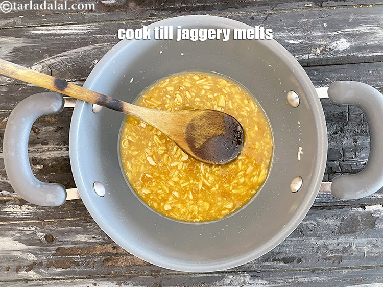 Step 15 – Keep cooking and stirring it continuously till the jaggery melts completely.