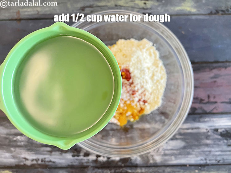 Step 15 – Add 1/2 cup water to make a dough.