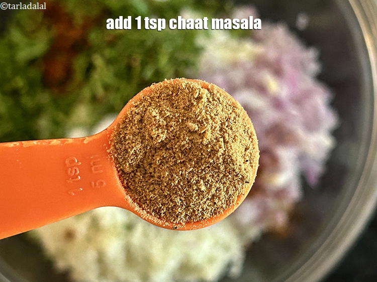 Step 19 – <meta charset="UTF-8" />Add 1 tsp&nbsp;<a href="https://www.tarladalal.com/glossary-chaat-masala-300i">chaat masala</a>.<br /> &nbsp;