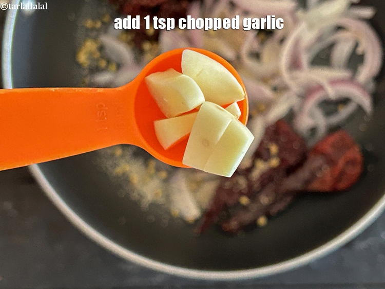 Step 14 – Add <strong>1 tsp chopped garlic.</strong>