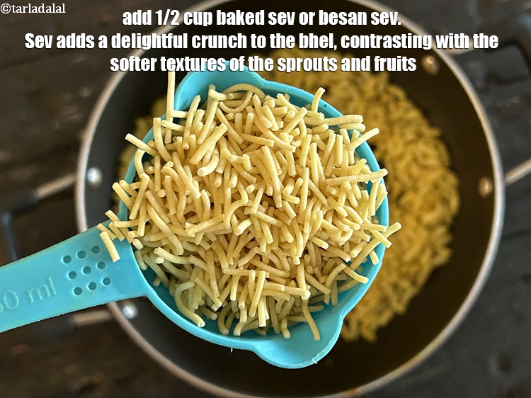 Step 13 – Add&nbsp;<meta charset="UTF-8" />1/2 cup&nbsp;<a href="baked-sev-32978r">baked sev</a>&nbsp;or&nbsp;<a href="besan-sev-2791r">besan sev</a>.&nbsp;Sev adds a delightful crunch to the bhel, …