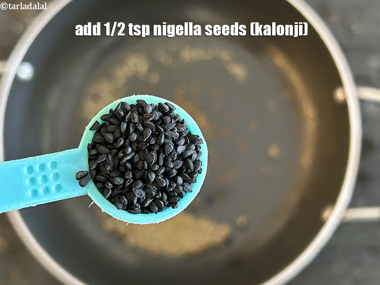 Step 12 – Add&nbsp;<meta charset="UTF-8" />1/2 tsp&nbsp;<a href="glossary-nigella-seeds-kalonji-onion-seeds-552i">nigella seeds (kalonji)</a>.