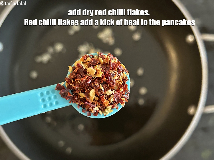 Step 11 – Add&nbsp;1/2 tsp&nbsp;<a href="https://www.tarladalal.com/glossary-dry-red-chilli-flakes-paprika-338i">dry red chilli flakes (paprika)</a>.&nbsp;Red chili flakes add a kick of heat to …