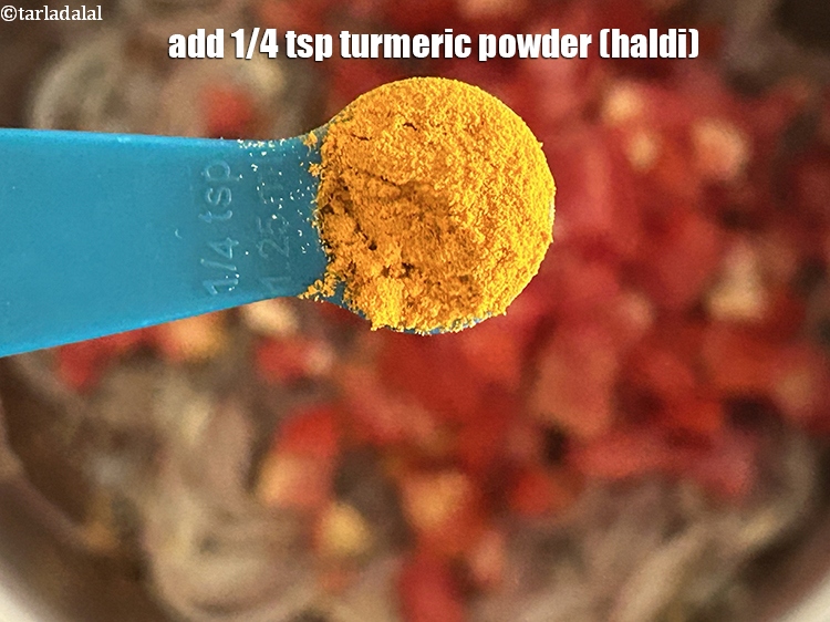 Step 15 – Add&nbsp;<meta charset="UTF-8" />1/4 tsp&nbsp;<a href="glossary-turmeric-powder-haldi-645i">turmeric powder (haldi)</a>.