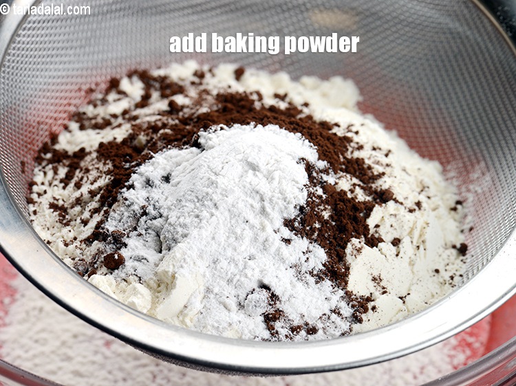 Step 15 – Add 1 tsp&nbsp;<a href="https://www.tarladalal.com/glossary-baking-powder-425i">baking powder</a>.