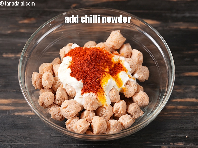Step 11 – Add &frac12; tbsp <a href="https://www.tarladalal.com/glossary-chilli-powder-red-chilli-powder-339i">chilli powder</a>.