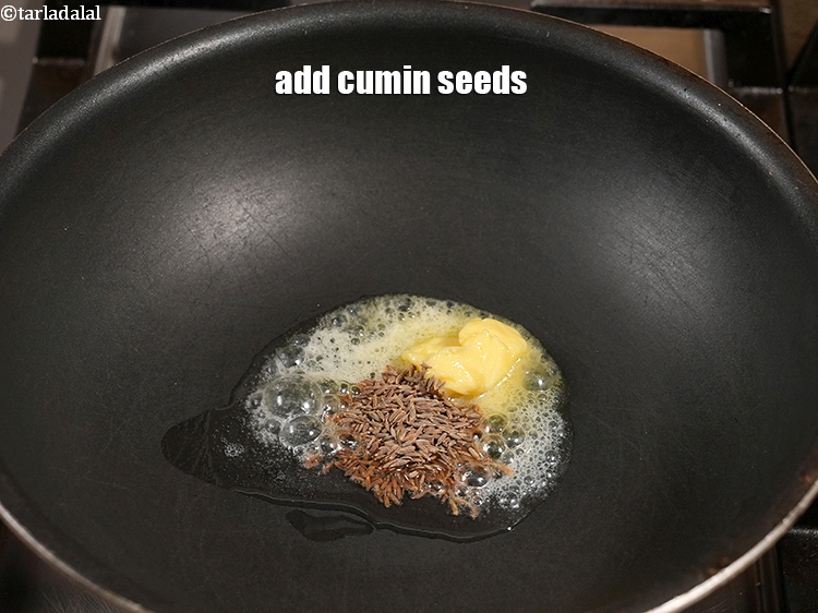 Step 11 – Add 1 tsp <a href="https://www.tarladalal.com/glossary-cumin-seeds-jeera-zeera-381i">cumin seeds (jeera)</a>.