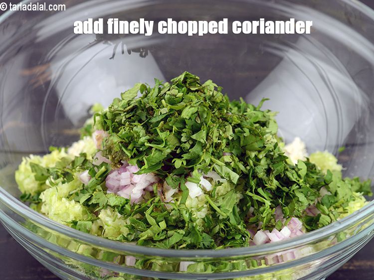 Step 11 – Add 2 tbsp finely <a href="https://www.tarladalal.com/glossary-chopped-coriander-783i">chopped coriander (dhania)</a>.