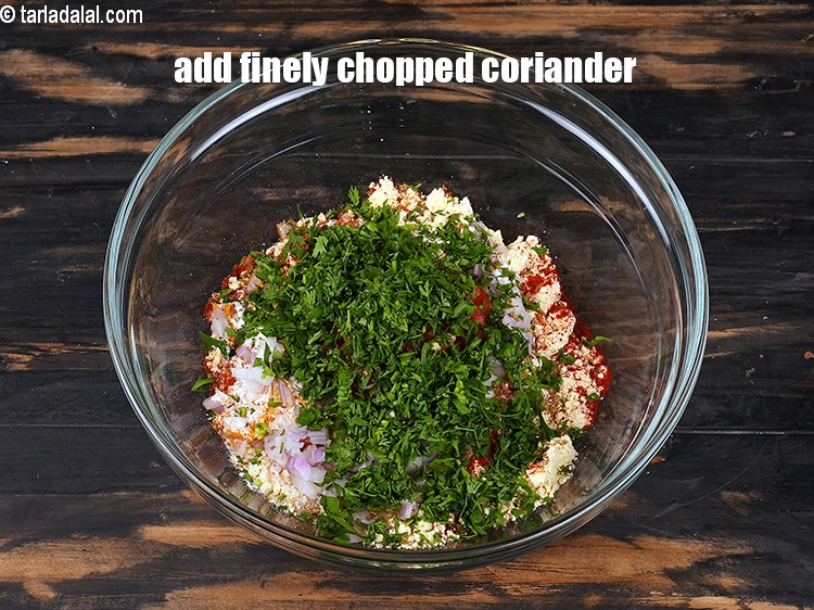 Step 12 – Add 2 tbsp&nbsp;finely&nbsp;<a href="https://www.tarladalal.com/glossary-chopped-coriander-783i">chopped coriander (dhania)</a>.