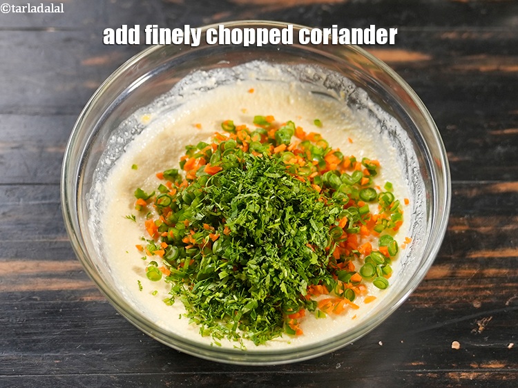 Step 11 – Add 2 tbsp finely <a href="https://www.tarladalal.com/glossary-chopped-coriander-783i">chopped coriander (dhania)</a>.