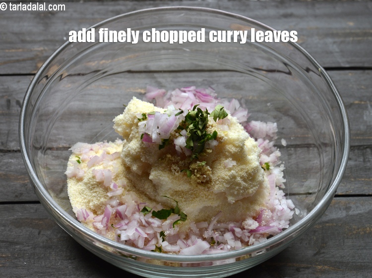 Step 11 – Add &frac12; tbsp finely <a href="https://www.tarladalal.com/glossary-chopped-curry-leaves-794i">chopped curry leaves (kadi patta)</a>.