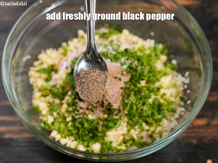 Step 11 – Add <a href="https://www.tarladalal.com/glossary-freshly-ground-black-pepper-kalimirch-powder-kali-mirch-ka-powder-567i">freshly ground black pepper (kalimirch)</a> to taste.