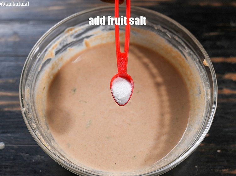 Step 18 – Finally add &frac12; tsp <a href="https://www.tarladalal.com/glossary-fruit-salt-420i">fruit salt</a>. Fruit salt is added to make the batter …