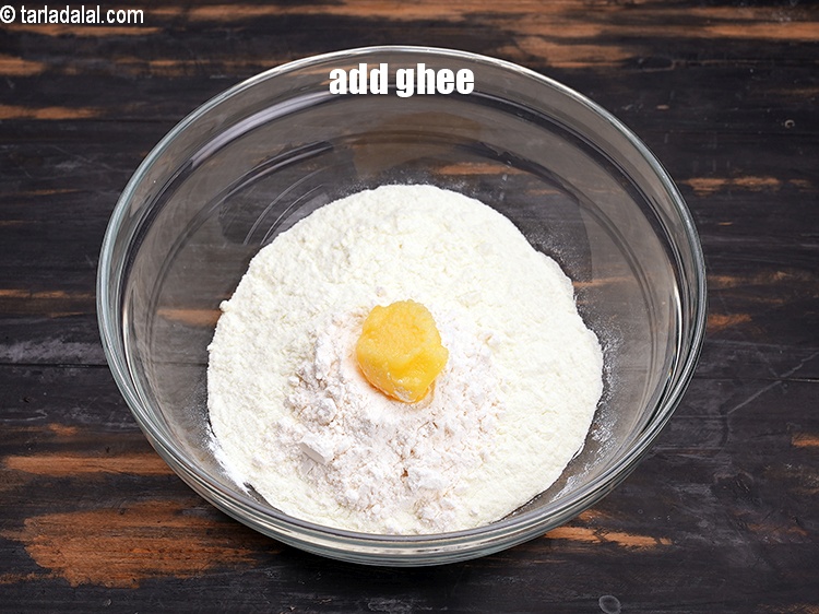 Step 12 – Add 1 tbsp&nbsp;<a href="https://www.tarladalal.com/glossary-ghee-245i">ghee</a>.&nbsp;