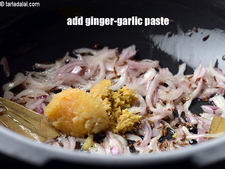 Step 11 – Add 2 tsp <a href="https://www.tarladalal.com/glossary-ginger-garlic-paste-adrak-lehsun-ki-pate-adrak-lahsun-ki-paste-939i">ginger-garlic (adrak-lehsun) paste</a>.