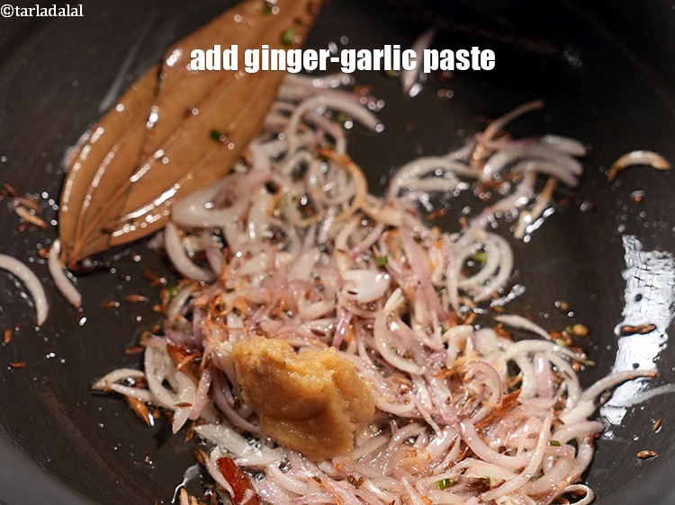Step 11 – Add &frac12; tbsp <a href="https://www.tarladalal.com/glossary-ginger-garlic-paste-adrak-lehsun-ki-pate-adrak-lahsun-ki-paste-939i">ginger-garlic (adrak-lehsun) paste</a>.